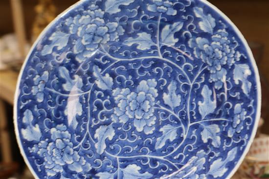 A Qianlong famille rose bowl and three blue and white plates